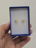 18K gold-plated bow and Valentino earrings