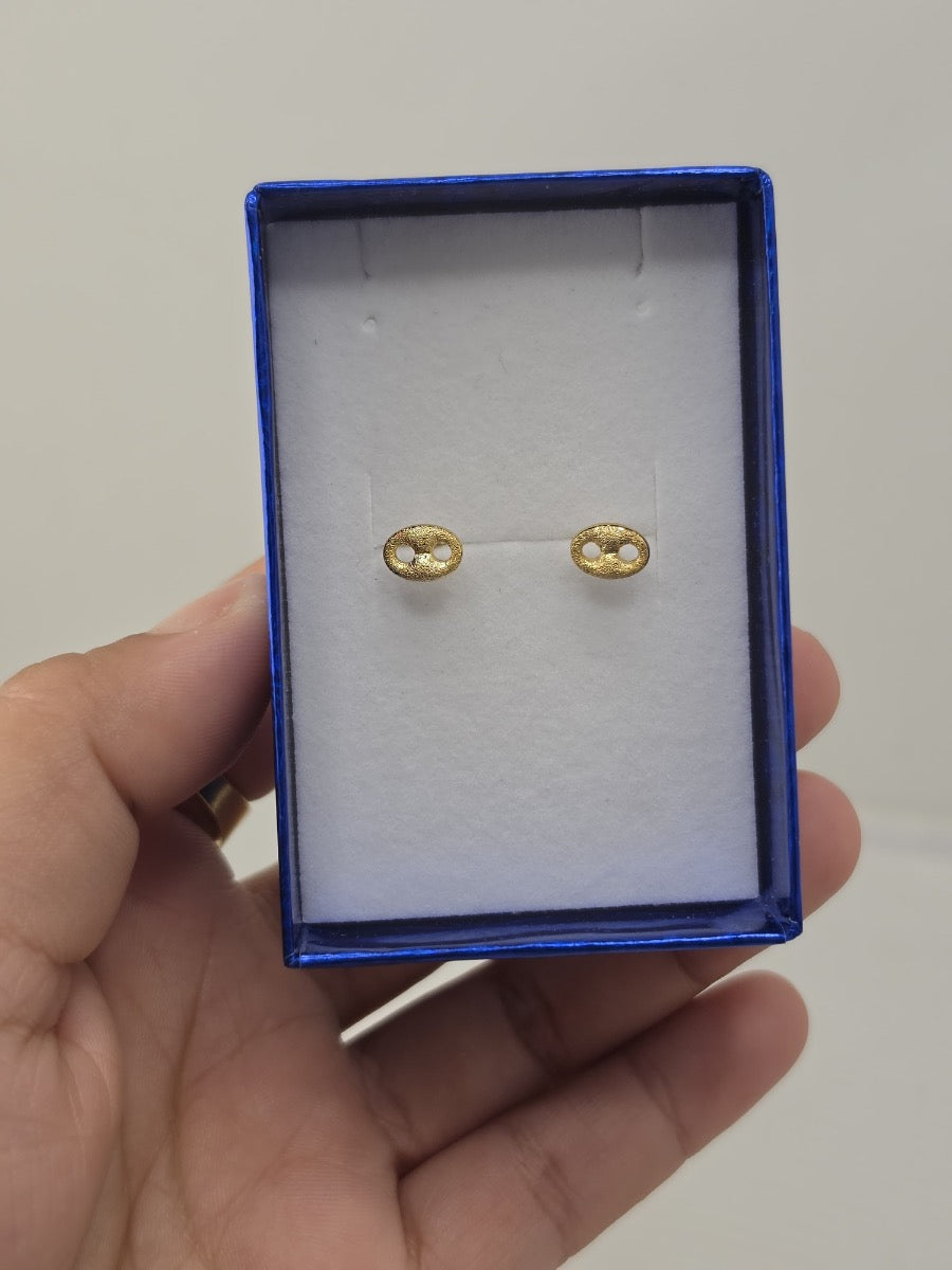 18K gold-plated bow and Valentino earrings