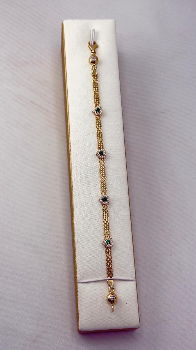 14K bracelet green heart y el otro es infinito con heart